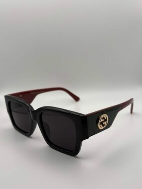 Gucci Black Sunglasses with Red Temples and Gold Emblem